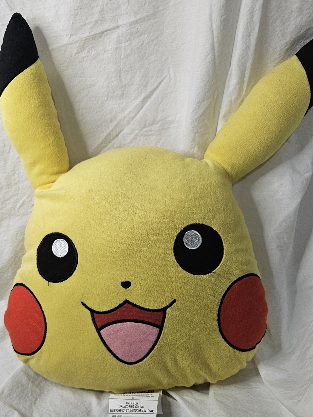 The Pokemon Pikachu Head Plush Pillow.